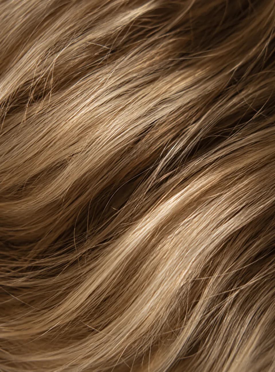 Close crop of healthy, softly waved hair